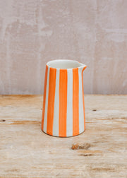 Musango Pottery Candy Stripe Creamer in Tangerine