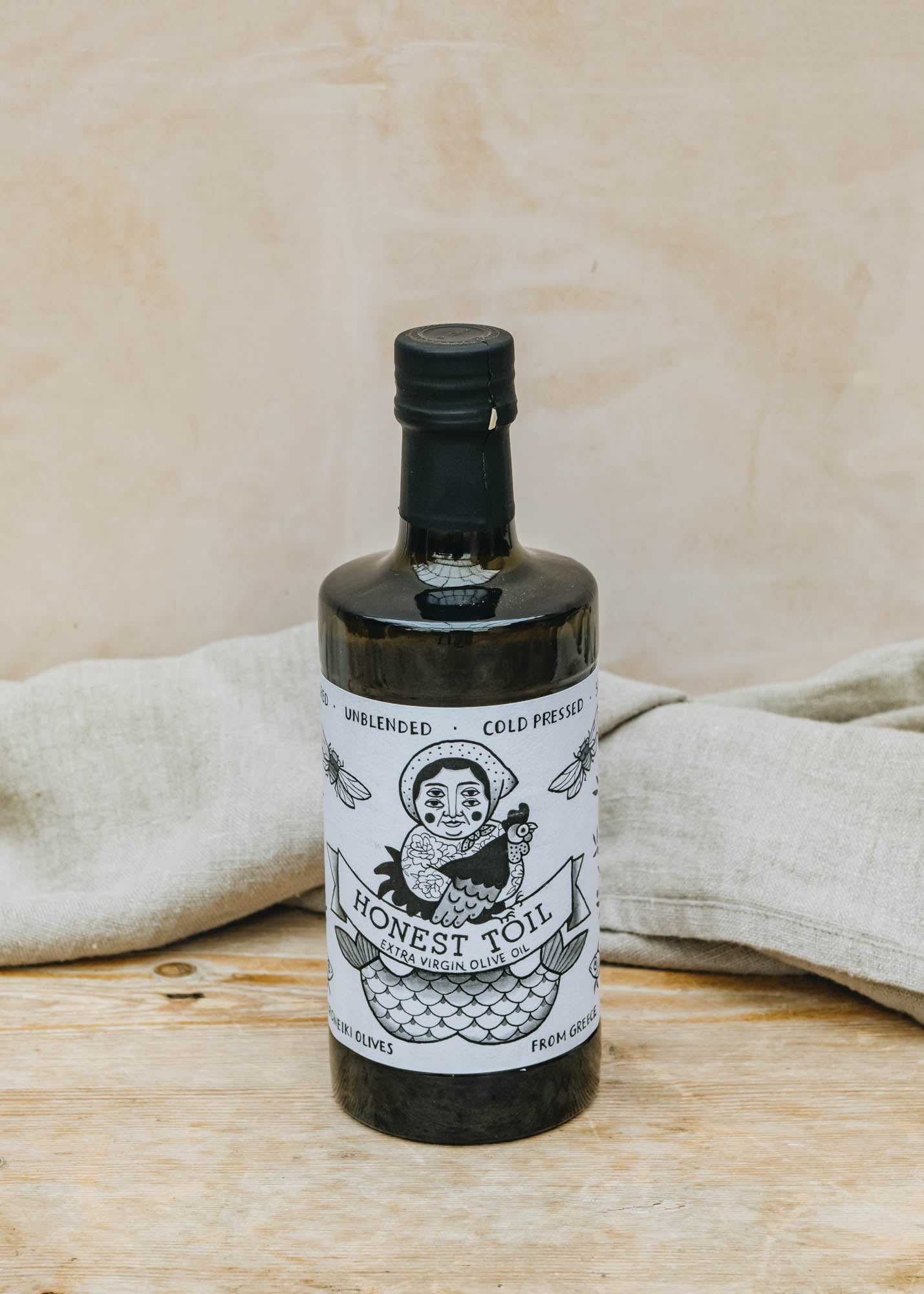 Honest Toil Extra Virgin Olive Oil in Dark Bottle