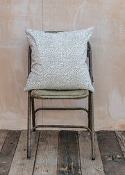 AfroArt A World Of Craft Fleck Cushion in White and Black