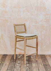 Gommaire Mieke Teak Bar Chair in Natural Grey and Sand Wicker with Bouclé Cushion