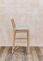 Gommaire Mieke Teak Bar Chair in Natural Grey and Sand Wicker with Bouclé Cushion