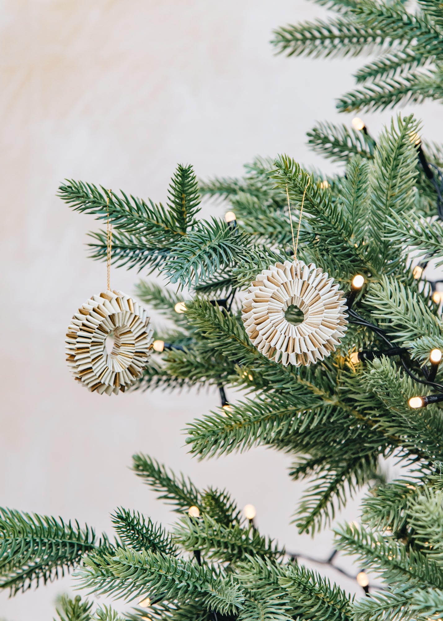 Spin Ornaments in White and Gold, pack of two