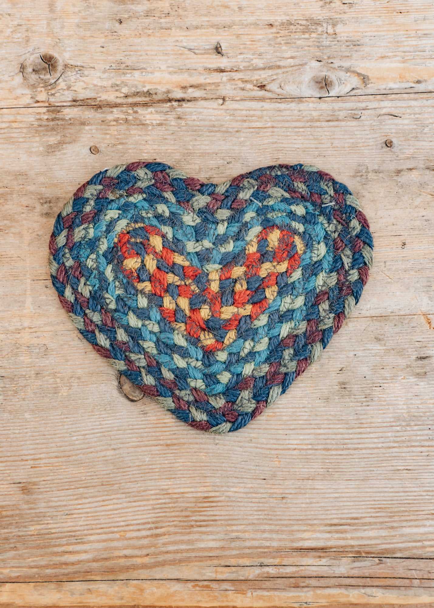 The Braided Rug Co. Heart Coaster in Blue Carnival