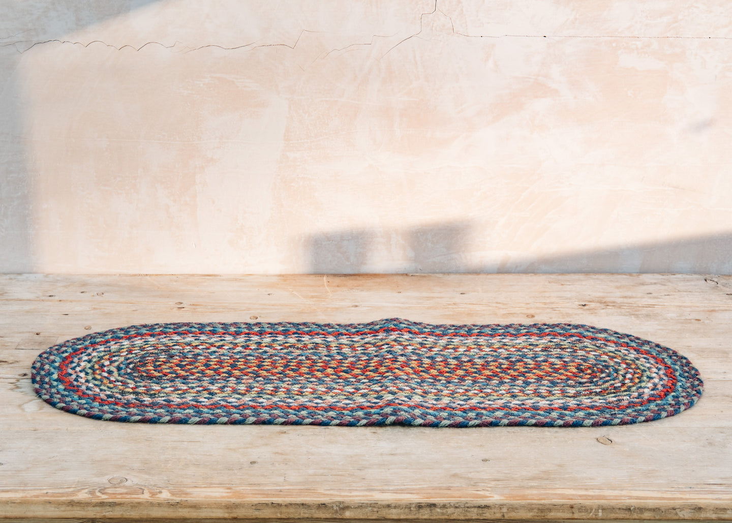 The Braided Rug Co. Table Runner in Carnival Blue