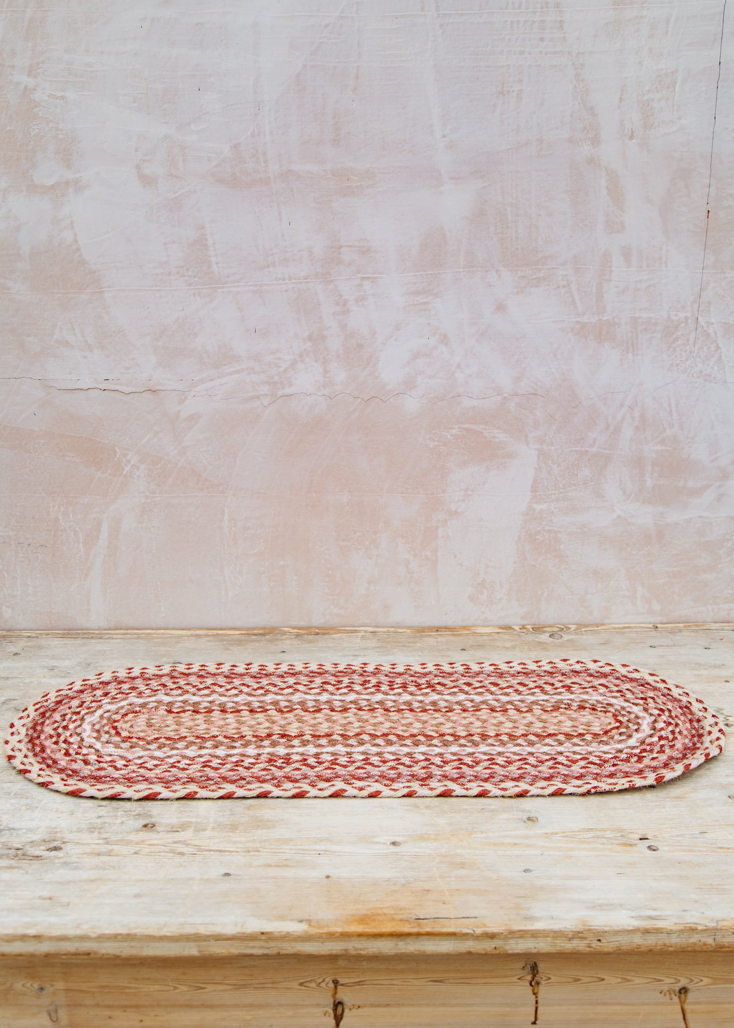 The Braided Rug Co. Table Runner in Coral
