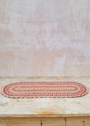 The Braided Rug Co. Table Runner in Coral