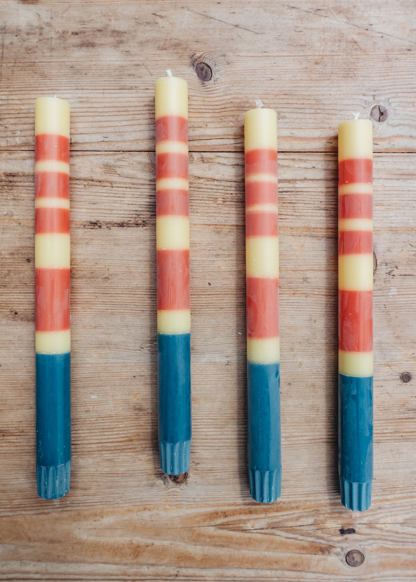 Dinner Candles in Striped Jasmine, Rust, and Petrol Blue, pack of four