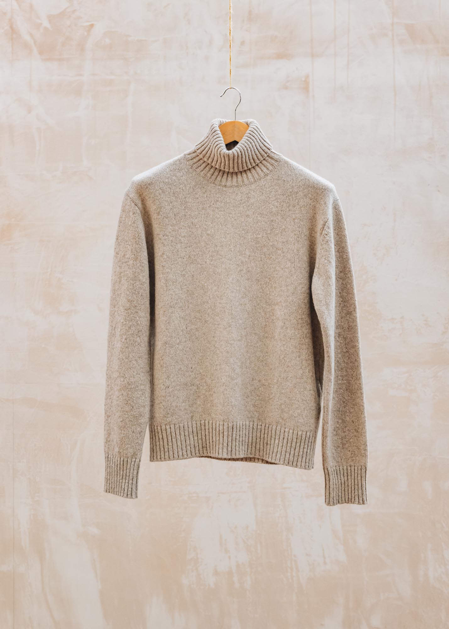 Universal Works Eco Wool Roll Neck Jumper in Oatmeal