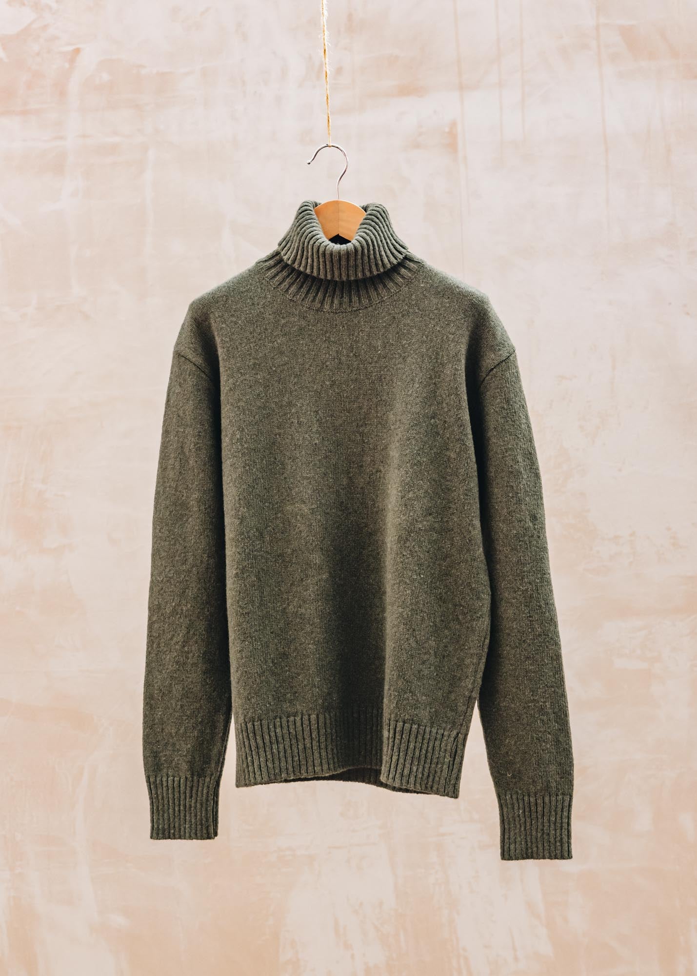 Universal Works Eco Wool Roll Neck Jumper in Olive