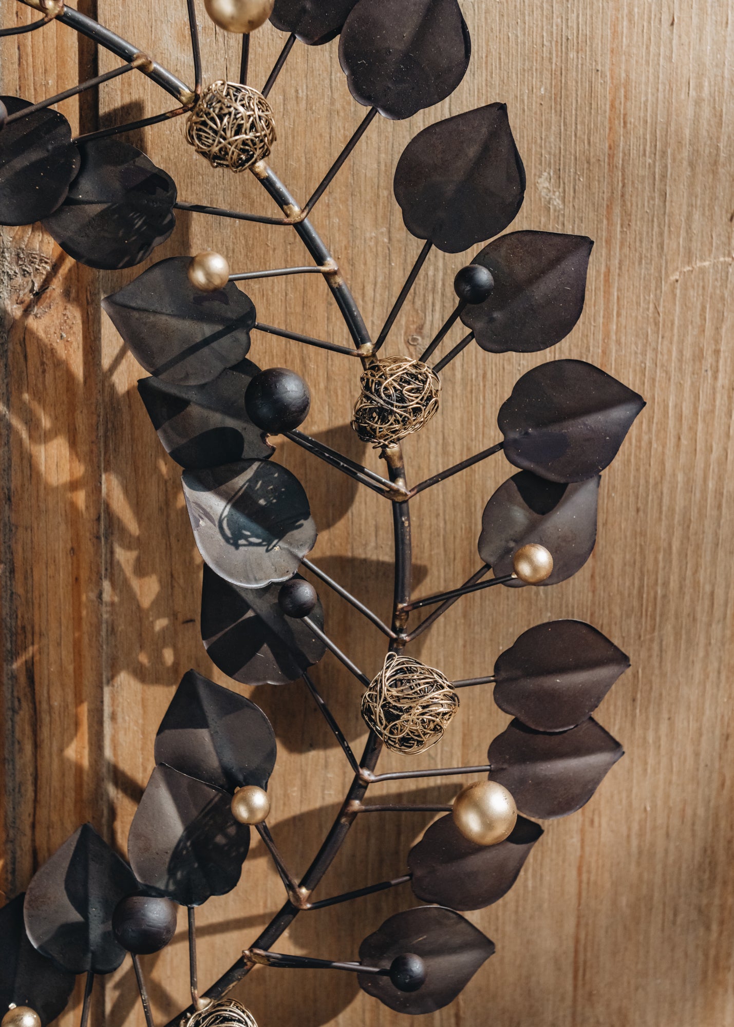 Nkuku Nkuku Ishana Wreath in Antique Brass Detail