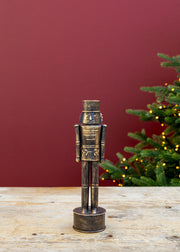 Small Imay Nutcracker Ornament in Antique Brass