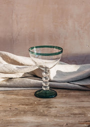 Nkuku Thimma Champagne Glass in Clear and Teal