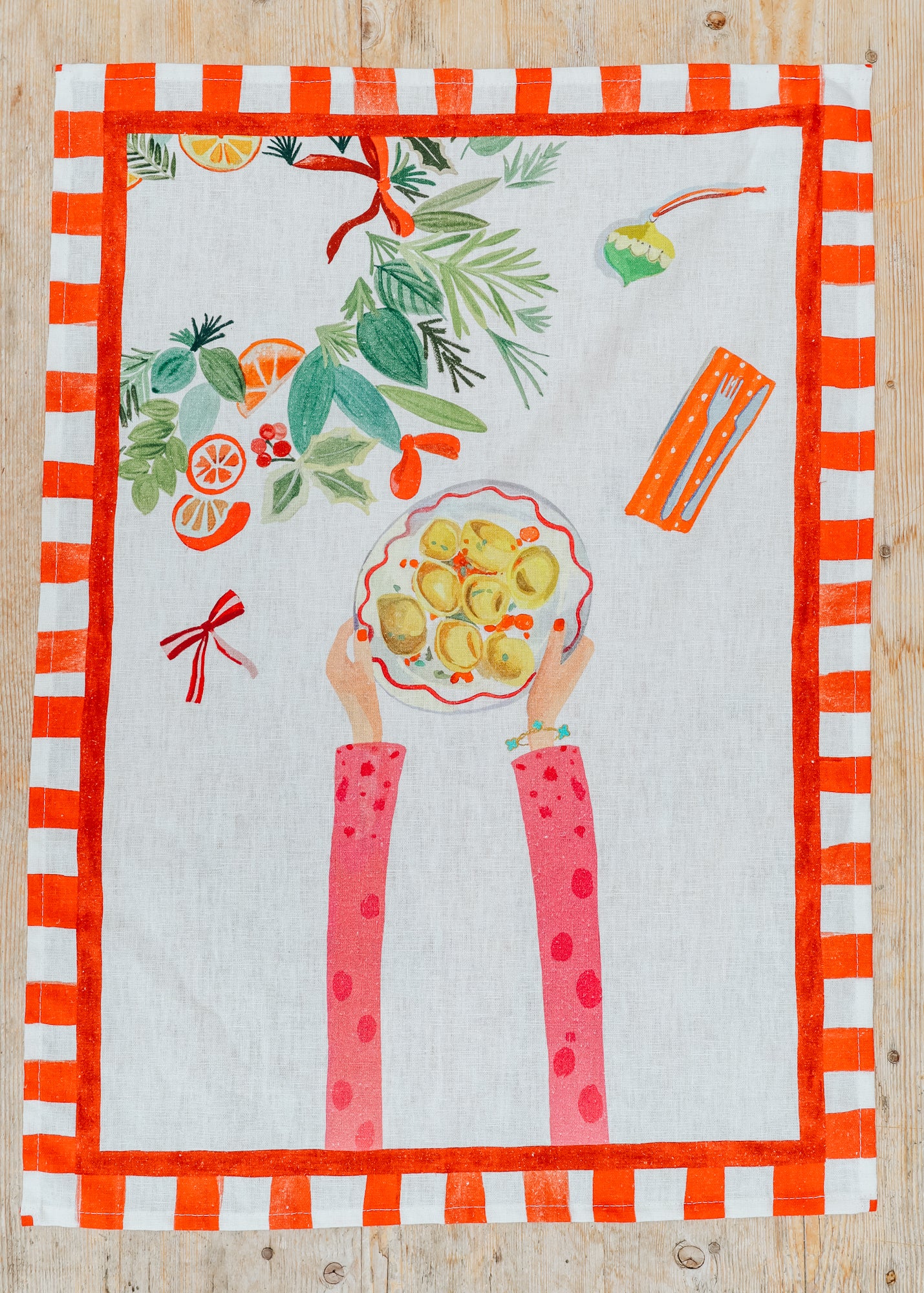Kitchen Towel in Hands On Christmas Tortellini