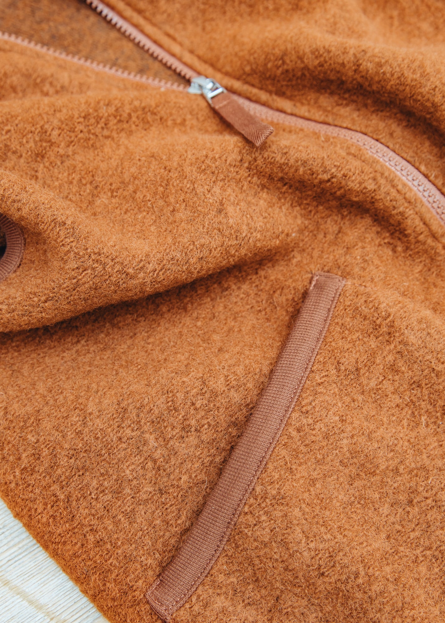 Universal Works Wool Fleece Zip Waistcoat in Rust